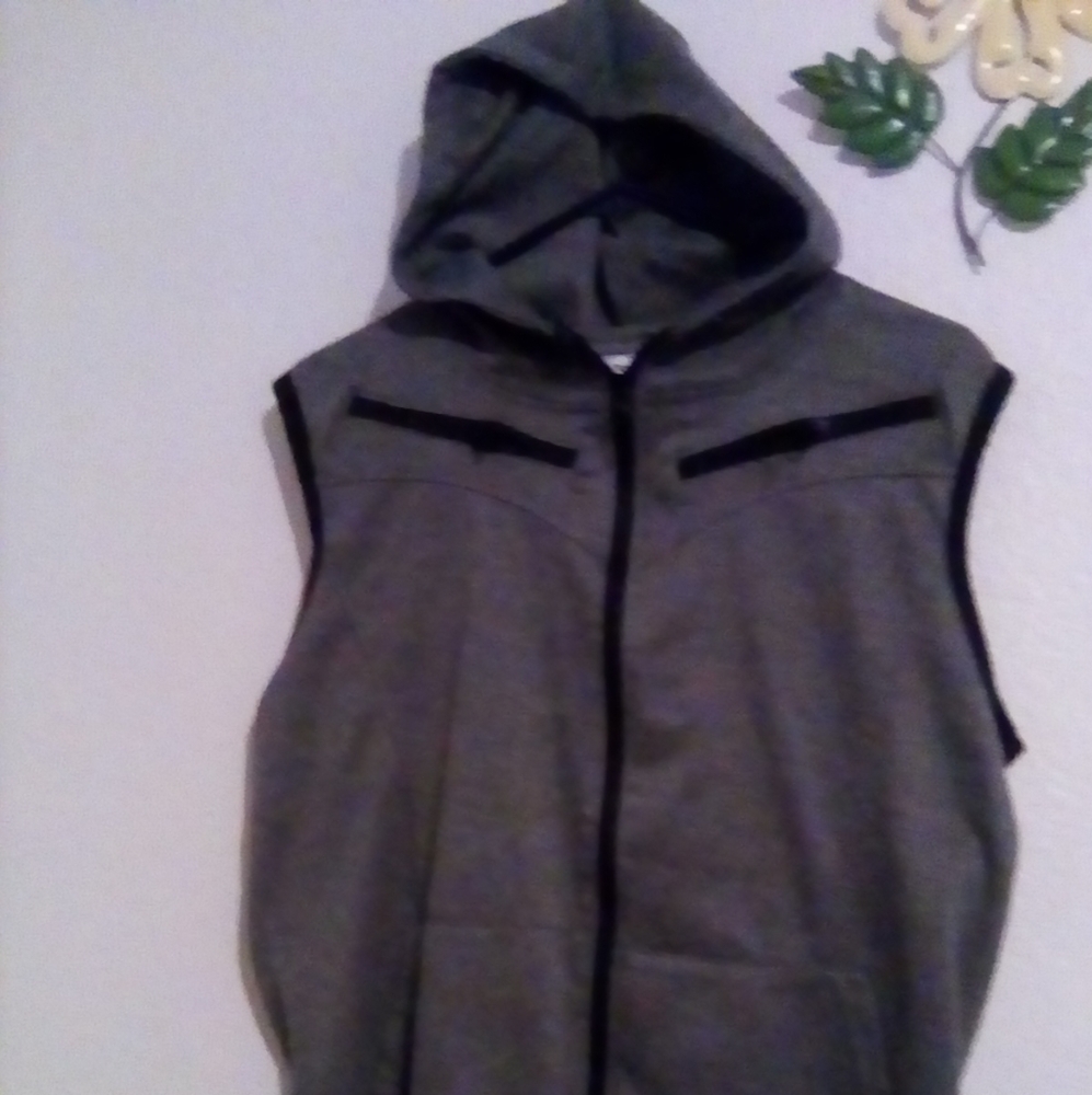 Sleeveless top with hood